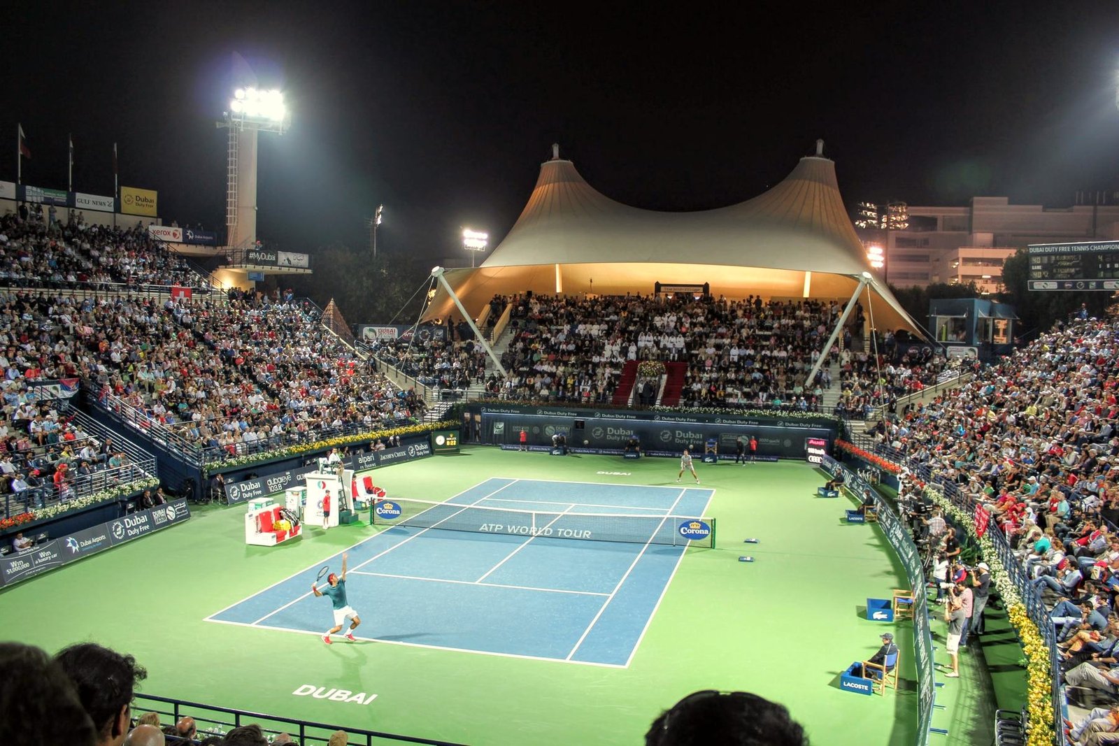 A floodlit tennis stadium in Dubai
